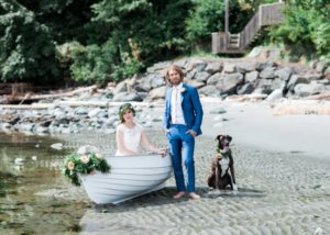 Couple and Dog in Boat Nautical Love West Coast Weddings