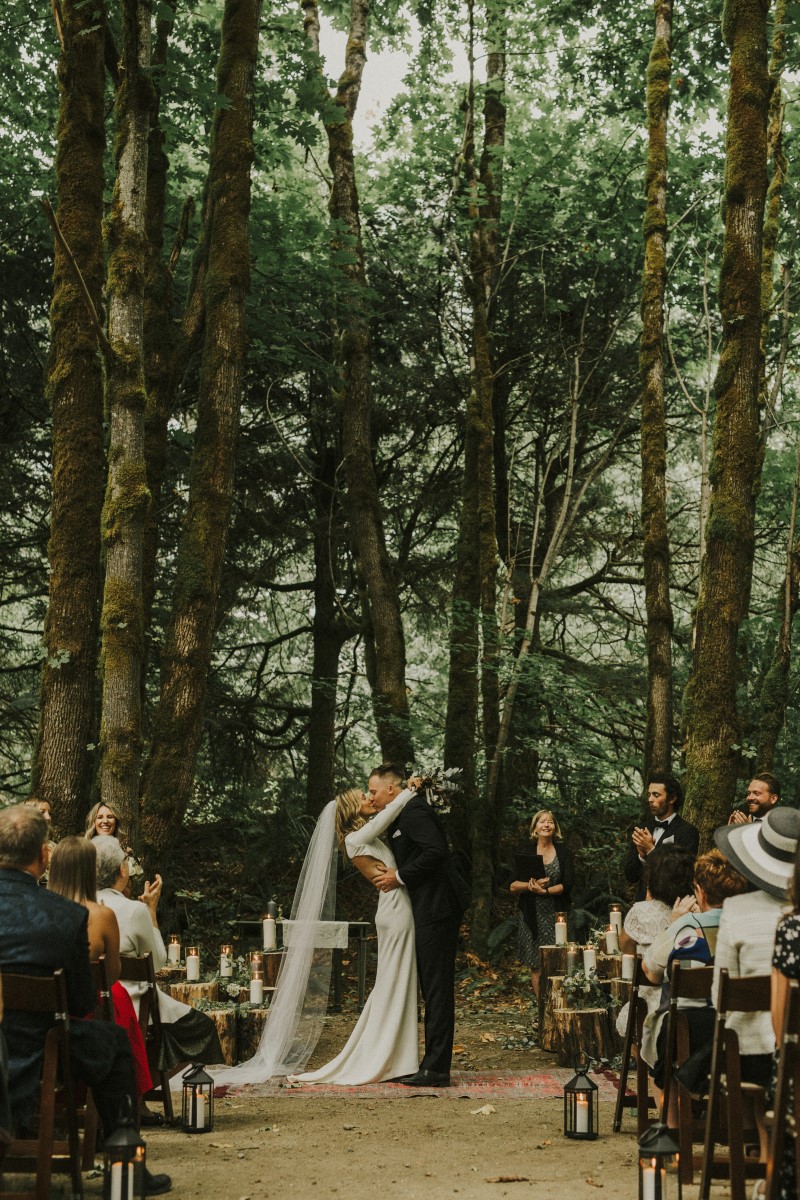Ceremony Kiss in the Forest Elegant Woodland West Coast Weddings Magazine Vancovuer