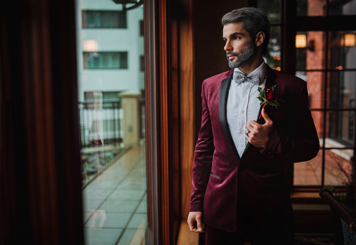 Holiday Glamour at Oak Bay Beach Hotel | Tasha Cline Photography | Beauty Bride | Cake by Taryn | Jennigs the Florist | Bliss Gowns & Events | Madison Paige Hair | Pretty Please Makeup Artistry | Groom in Burgundy Jacket