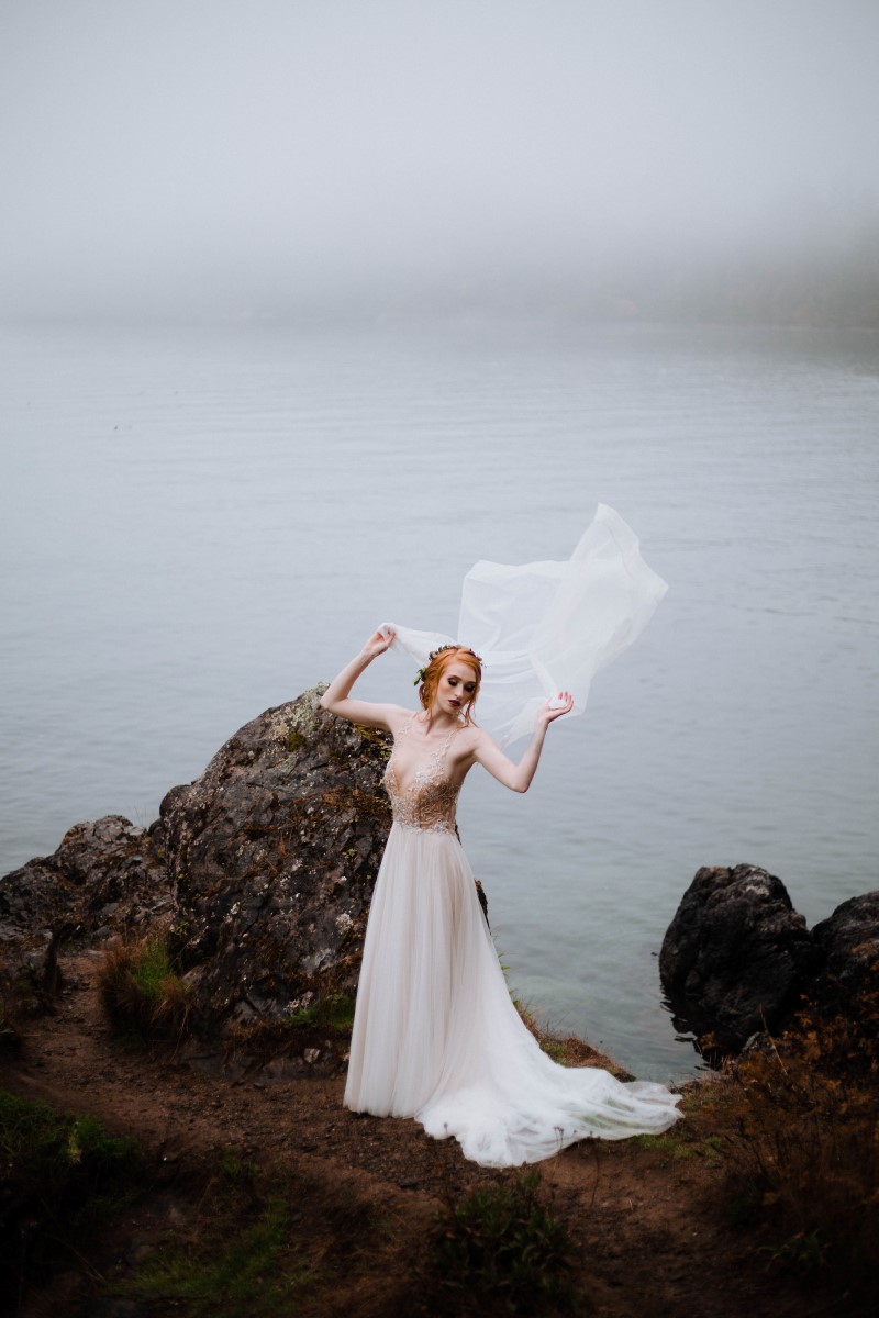 Celtic Bride with Veil in the Wind on cliffs of Vancouver Island Shades of White Bridal