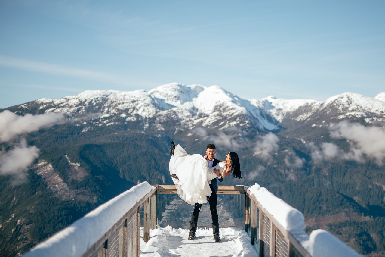 Sea to Sky Winter Dreamscape by Helen Sarah Photography Couple on Bridge Vancouver Wedding Magazine