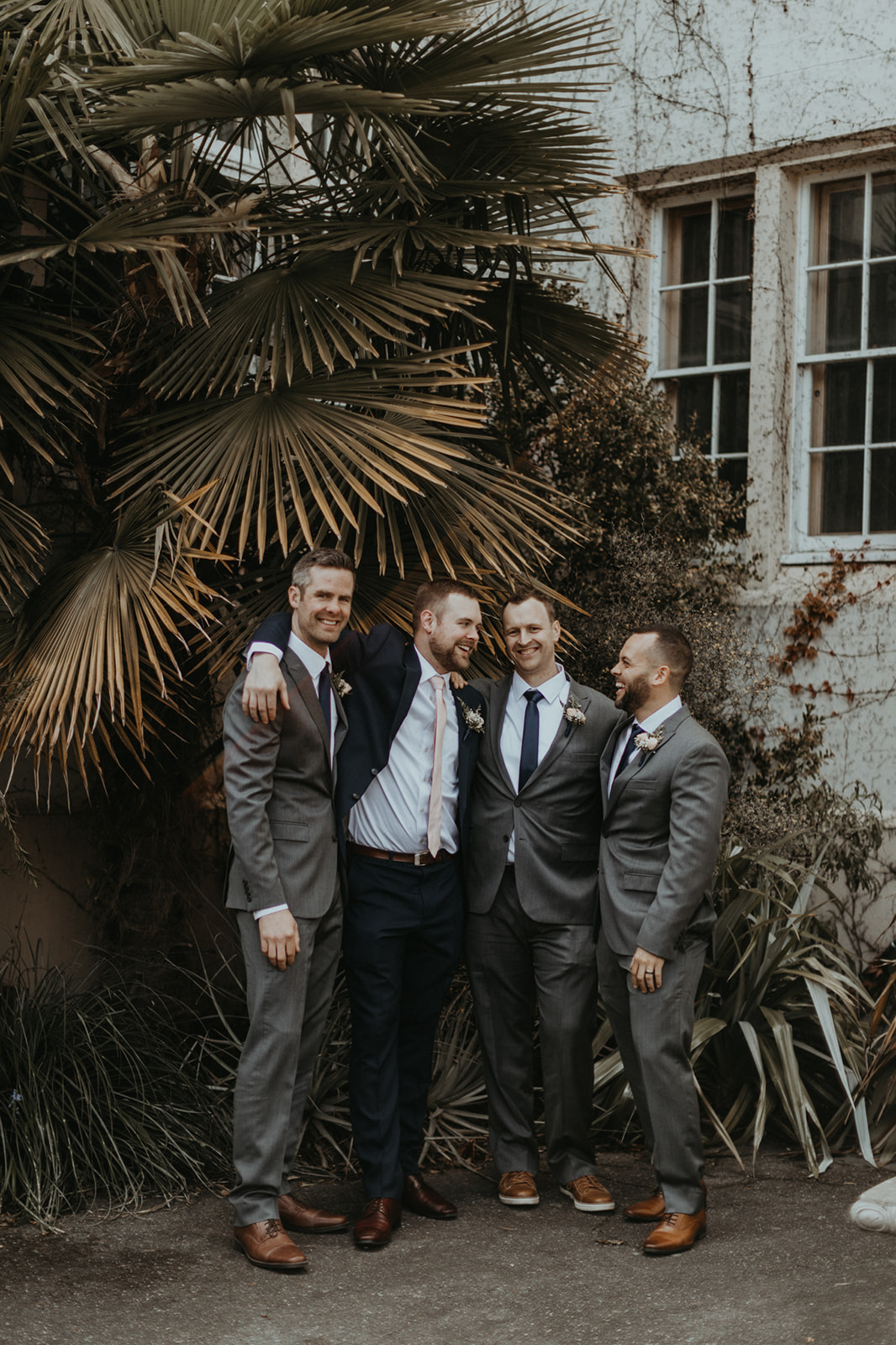 Groom and groomsmen in Moores Clothing for Men