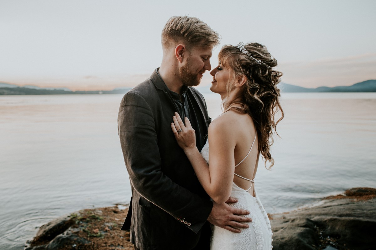 Newlywed Couple stand on rocky beach for Game of Thrones Wedding Styled Shoot