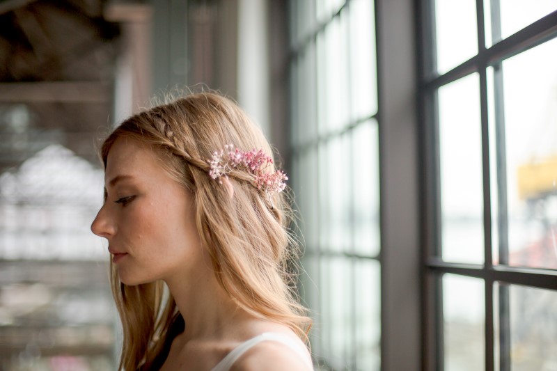 Bridal hair with braid and pink flowers by Danielle Wong Photography