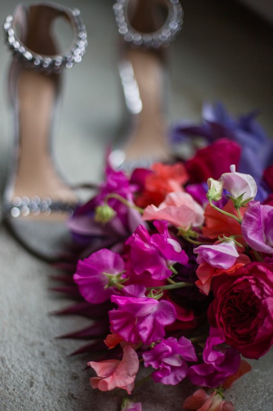 Purple, pink and white bridal bouquet with silver sparkly shoes