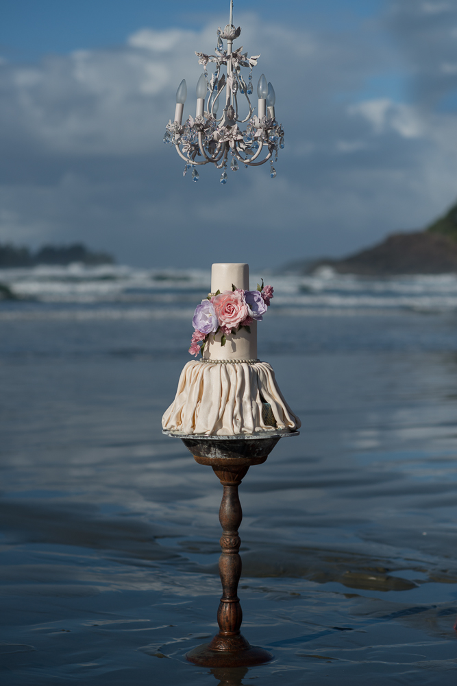 Cake Sitting in Ocean by Coastal Cake Company and Erin Wallis Photography at Long Beach Lodge Resort 