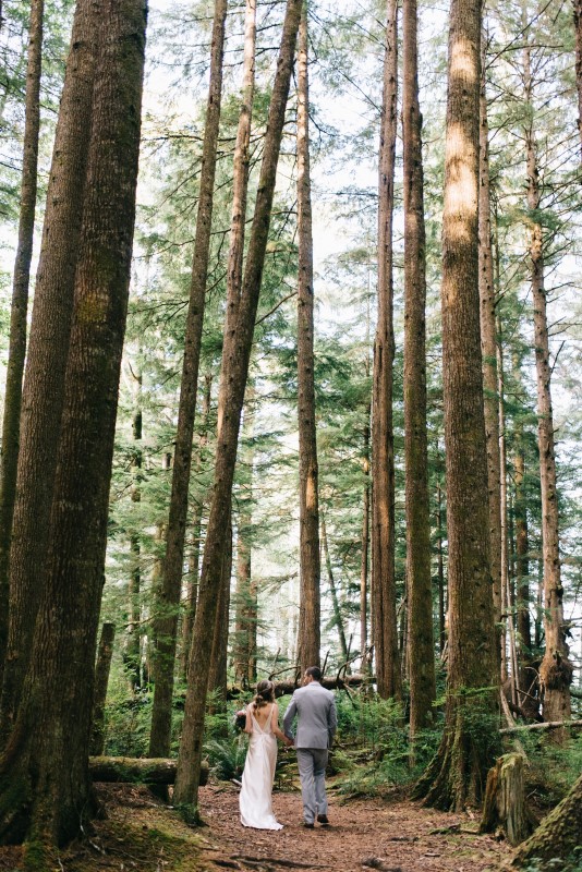 Newlyweds Walk in the Forest at Telegraph Cove on Vancouver Island