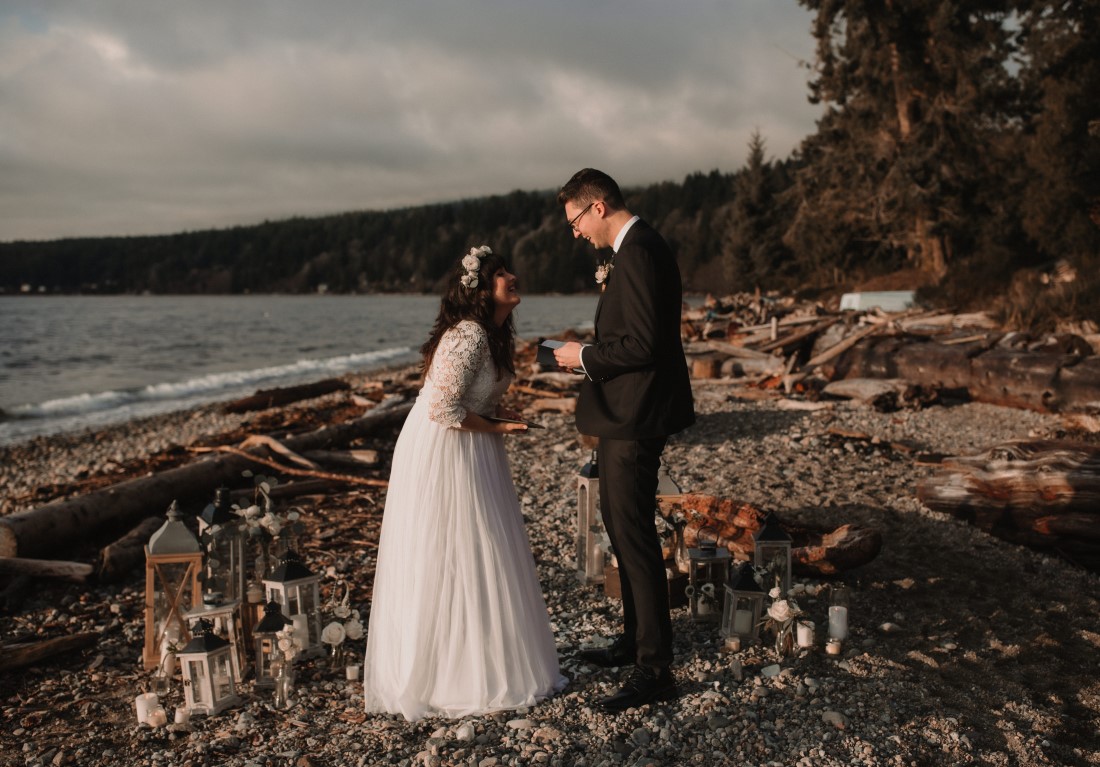 Sunshine Coast Elopement couple exchange vows in front of ocean view