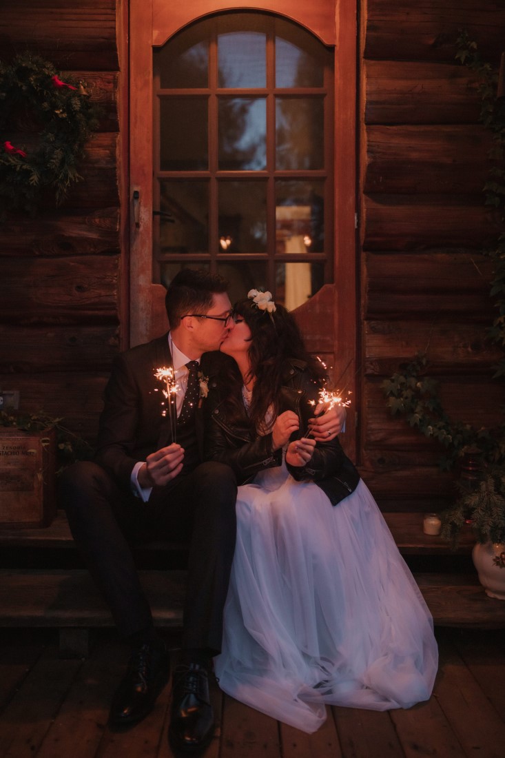 Sunshine Coast Elopement couple sits on the steps of cabin in Giibson 
