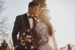 Sun kissed newlyweds kiss along Vancouver waterfront by Kacie McColm Photography