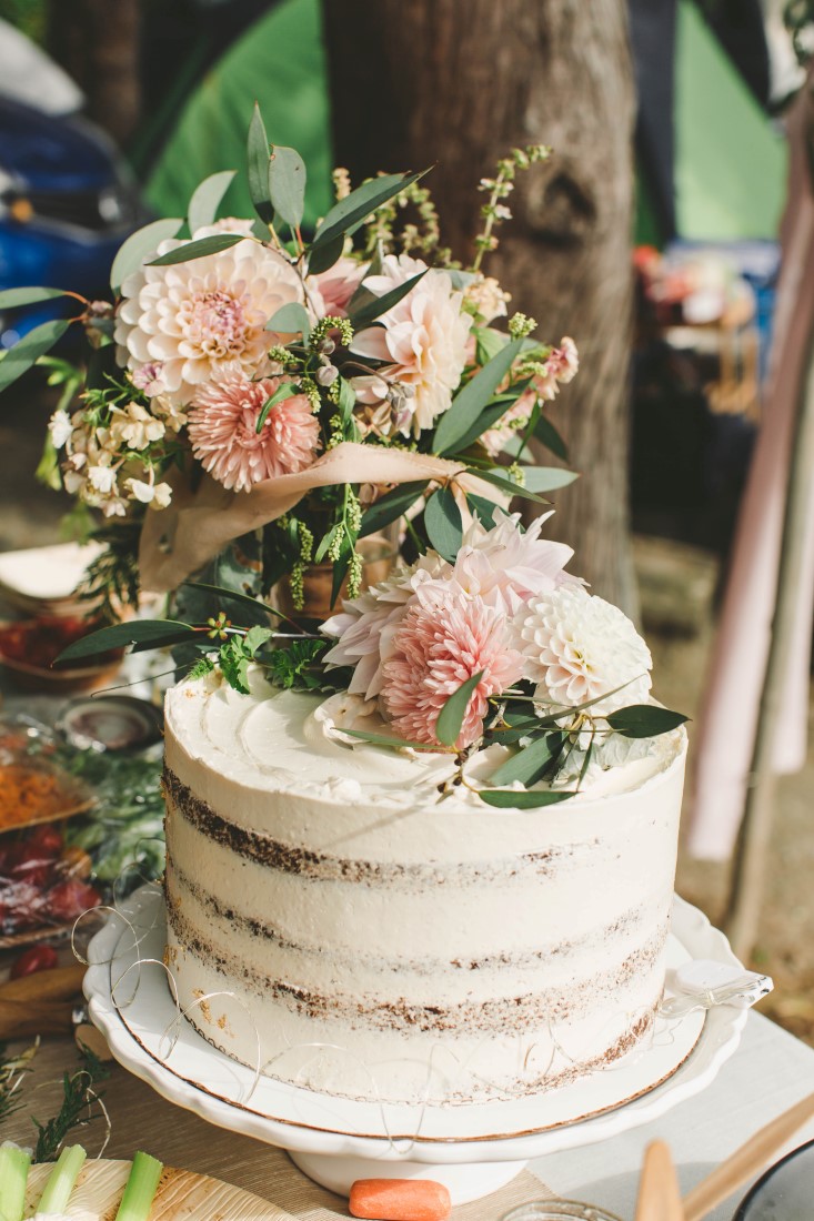 Naked Wedding Cake with Blush Roses and Greenery by Ruth and Dean