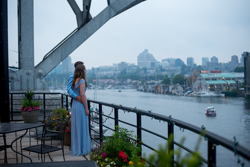Bridesmaid looks out at Vancouver Docks at False Creek Yacht Club 