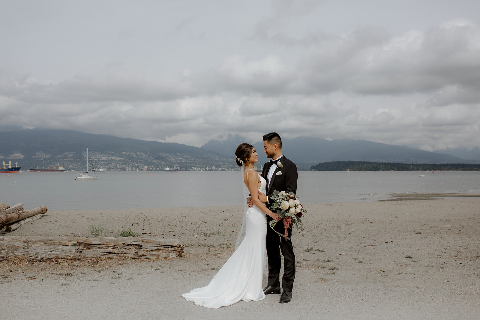 Newlyweds On West Coast Beach by Kaoverii Silva and Elle Weddings