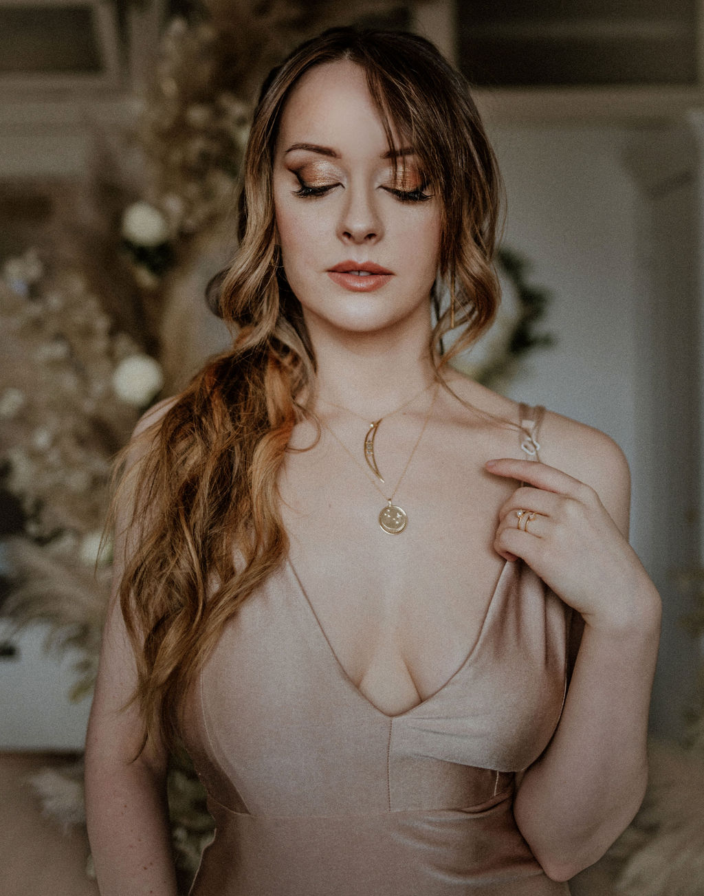 Bride wears Sarah Mulder necklace and beige slip dress 