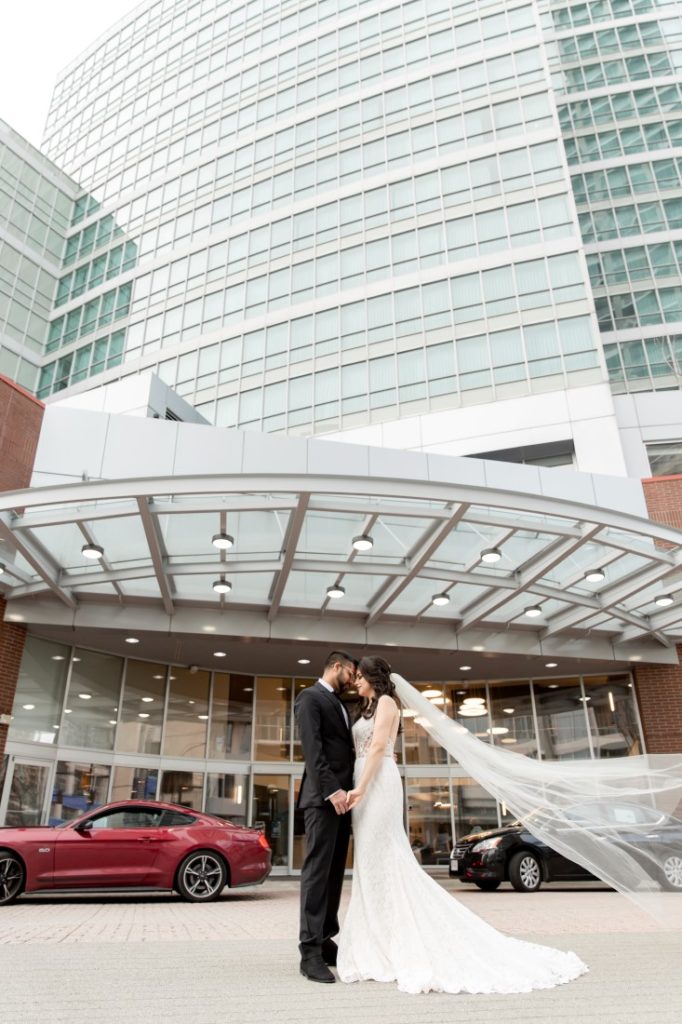 Bridal Couple in front of Vancouver Hilton Metrotown