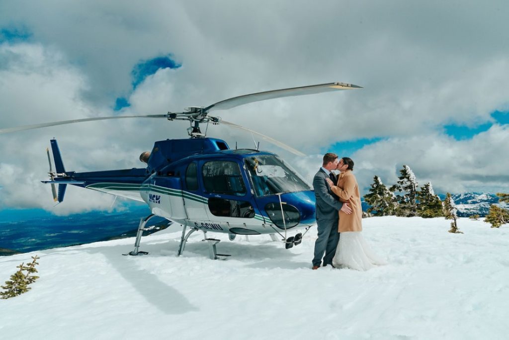 Wedding From Above Janayh Wright Photography couple arrives on mountaintop