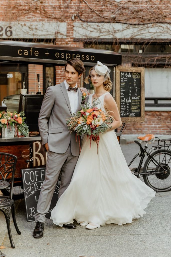 Coffee Love in Comox Valley Luke Liable Photography bridal couple in front of cafe coffee bar