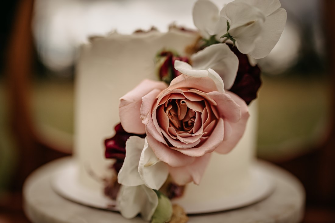 Blush roses on white wedding cake by Schur to Please Vancouver Island