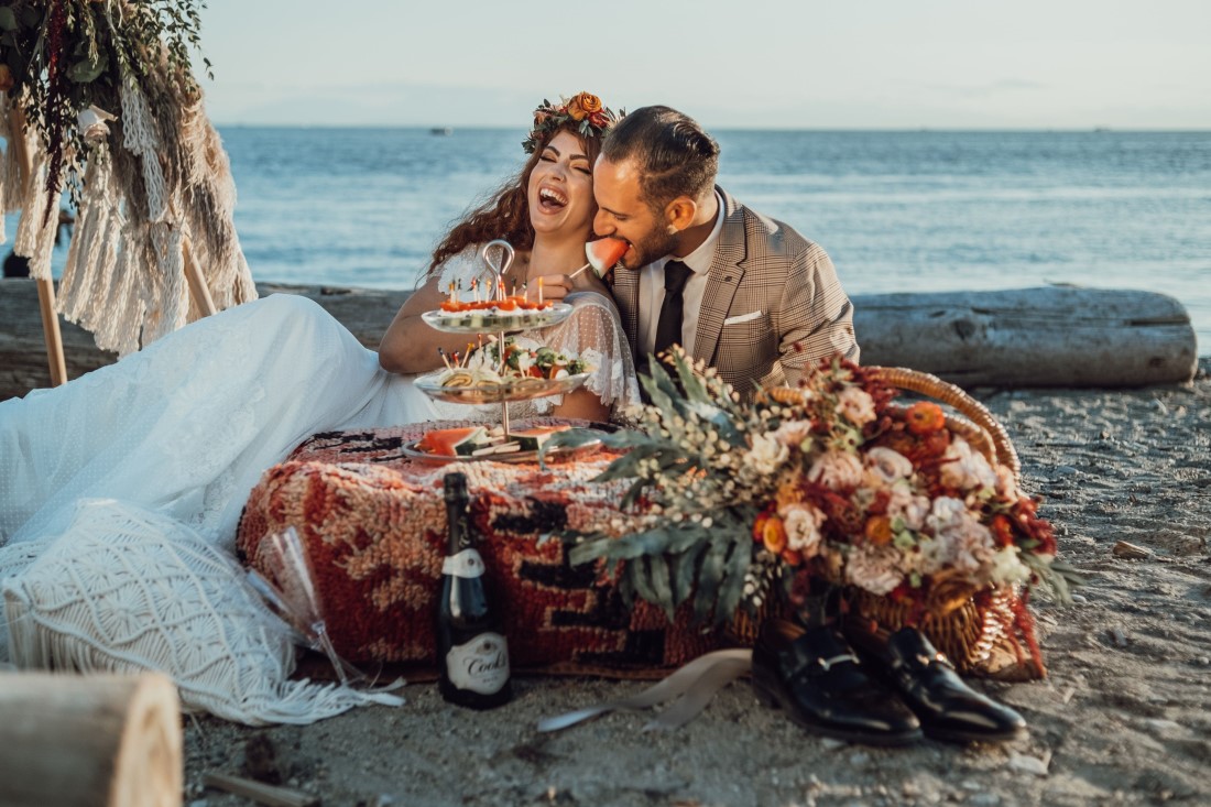 Bride and groom on Vancouver beach