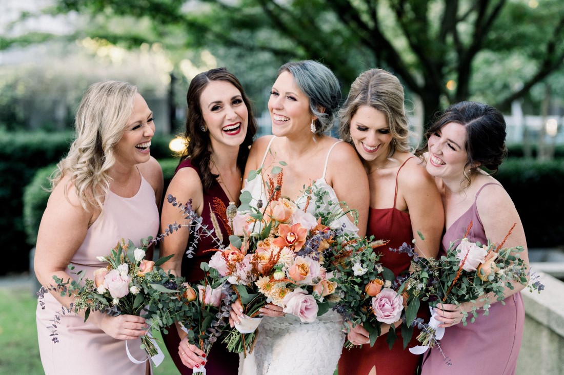Bride and bridesmaids holding gorgeous bouquets by Fremont Flowers Vancouver