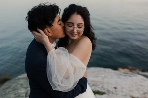The Augusts Newlyweds Kiss Seaside in the City Vancouver Wedding Inspiration