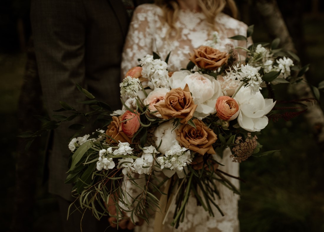 Incredible bridal bouquet of burnt orange roses and white peonies by Beyond the Bloom