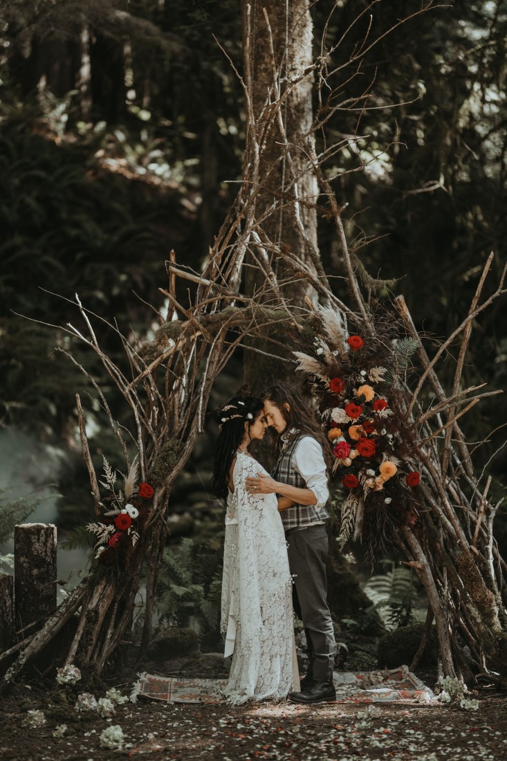 Whimsical and Woodsy wedding ceremony backdrop in Vancouver Island forest