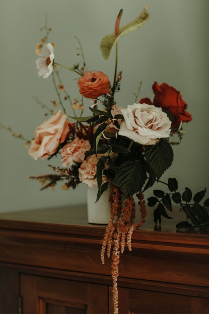 Peach and blush wedding reception flowers by Celsia Floral Vancouver
