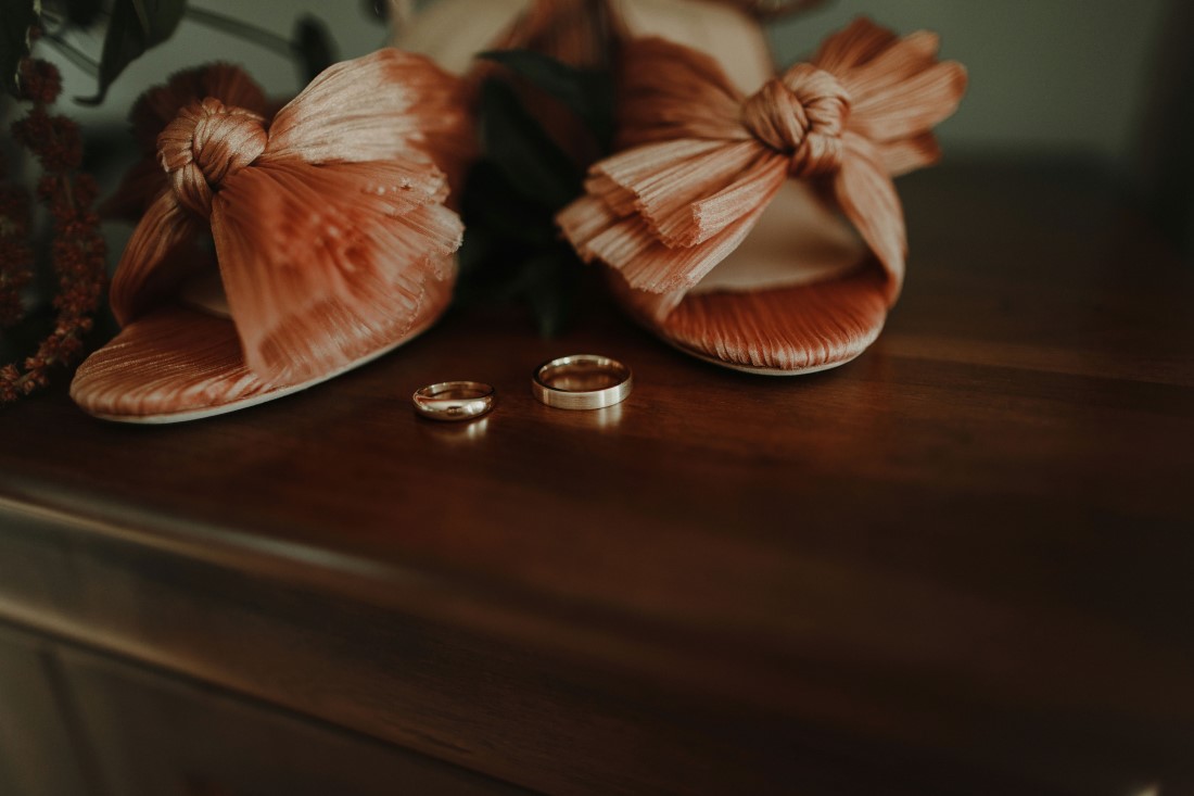 Blush pink slip on bridal shoes with rings