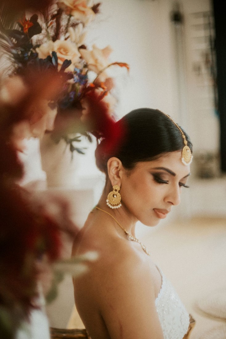 Bride in gold earrings