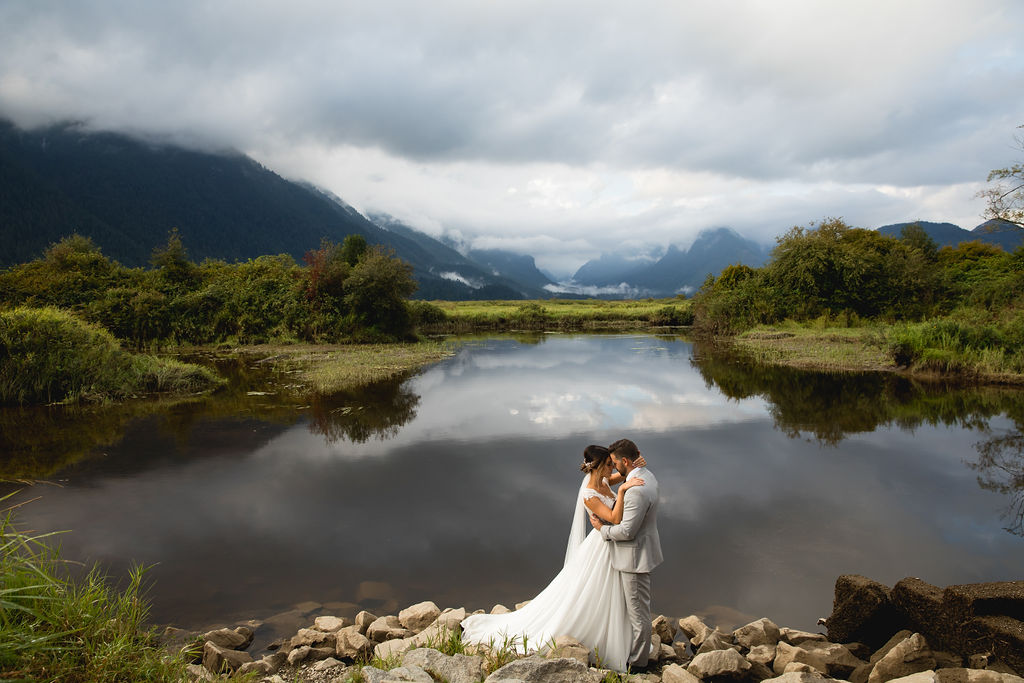 Epic shot of newlyweds at Pitt Lake British Columbia