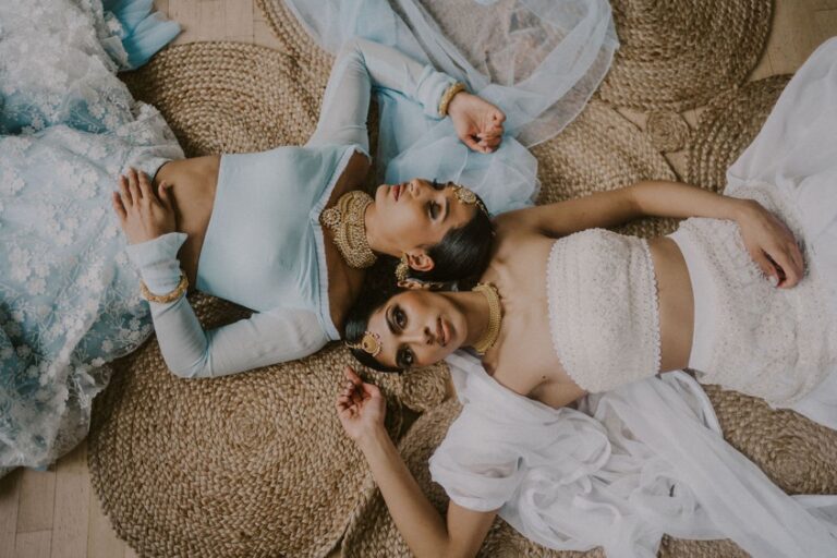 Indian brides in blush pink and baby blue gowns