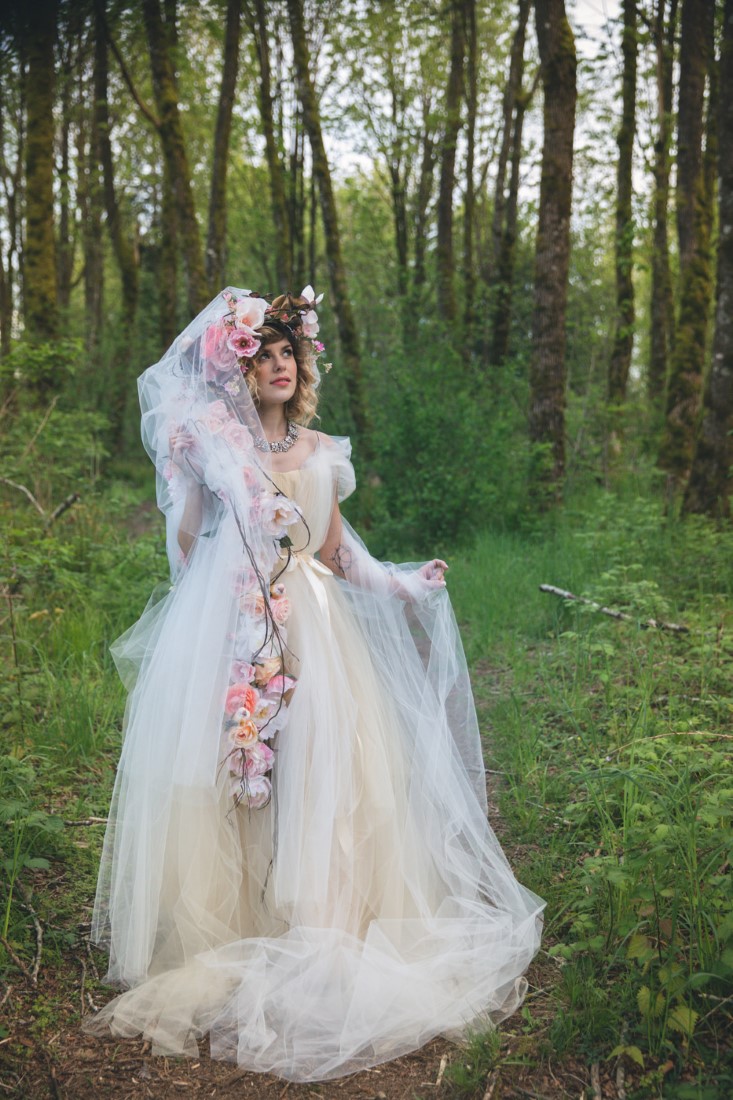 Romantic Vancouver bride in forest with floral hat by Deborah Lee Designs
