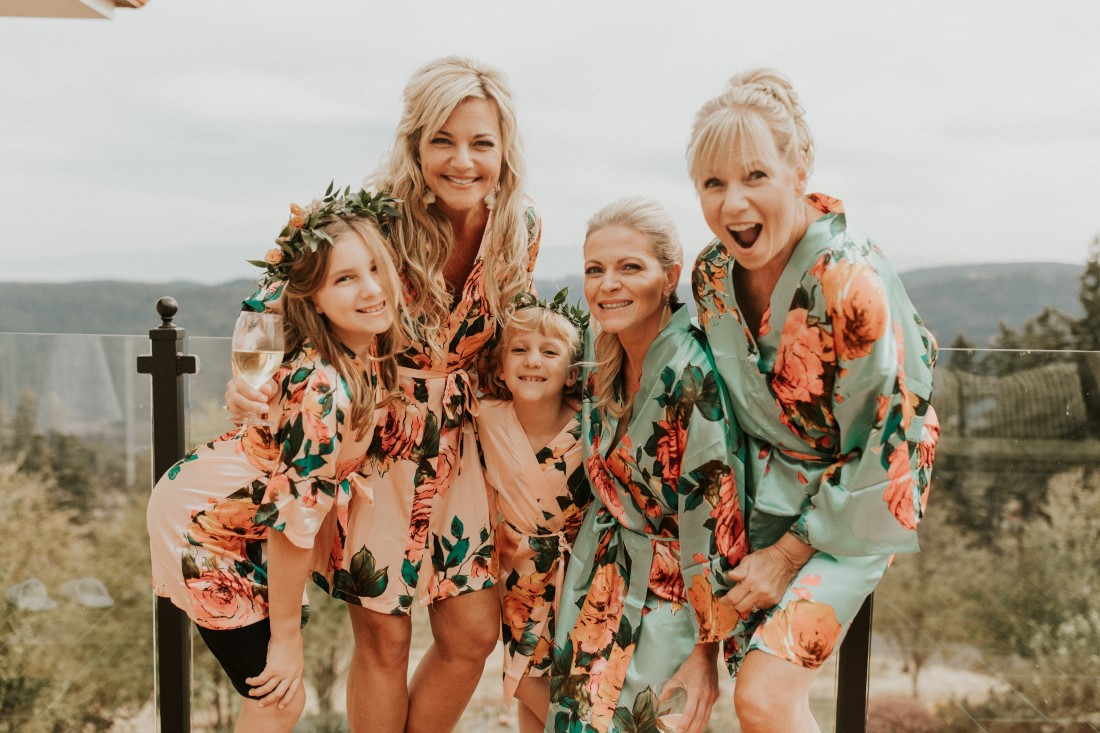 Bridesmaids in floral gowns getting ready at Villa Eyrie