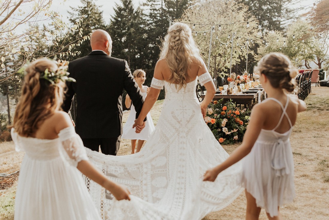 Bridal train carried by bridesmaids at Villa Eyrie 
