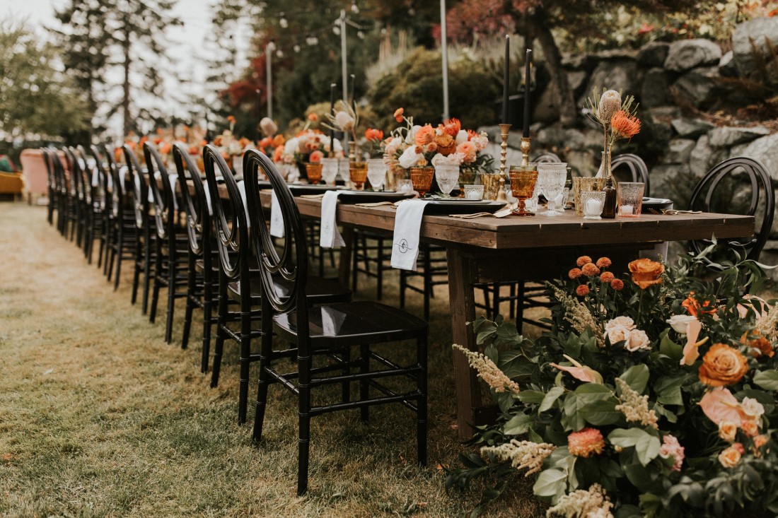 Perfect outdoor farm table decorated for wedding reception 