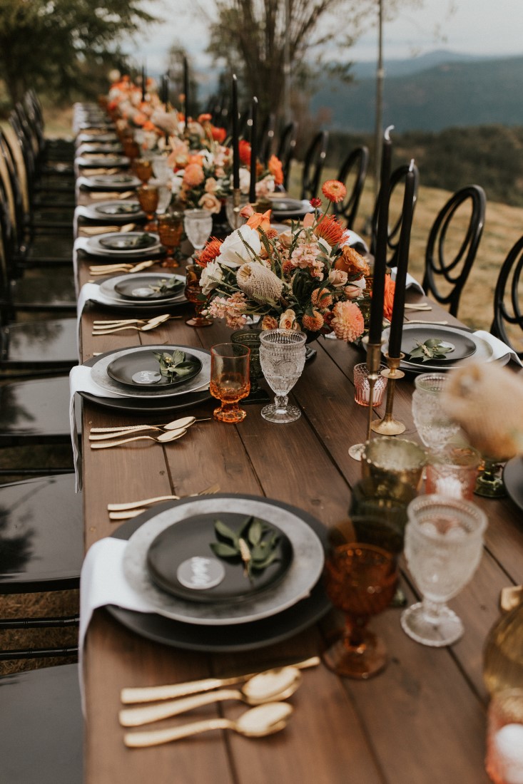 Wedding Farm Table with black plates and antique goblets