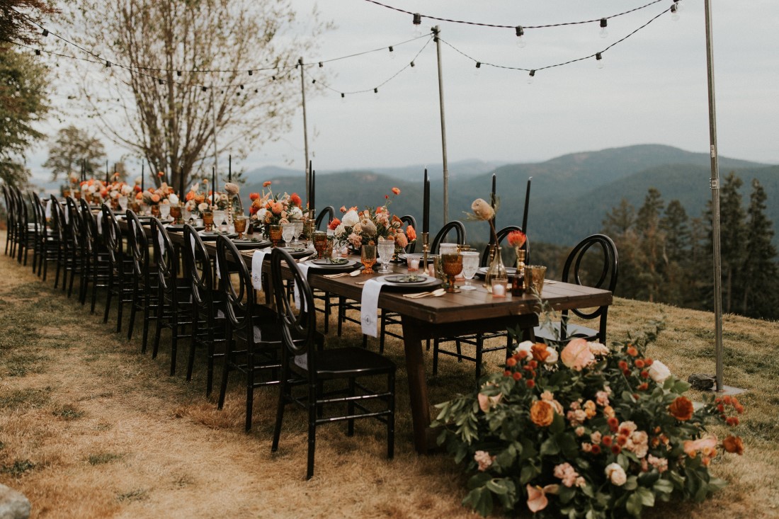 Wedding Farm table with cafe lights above at Villa Eyrie