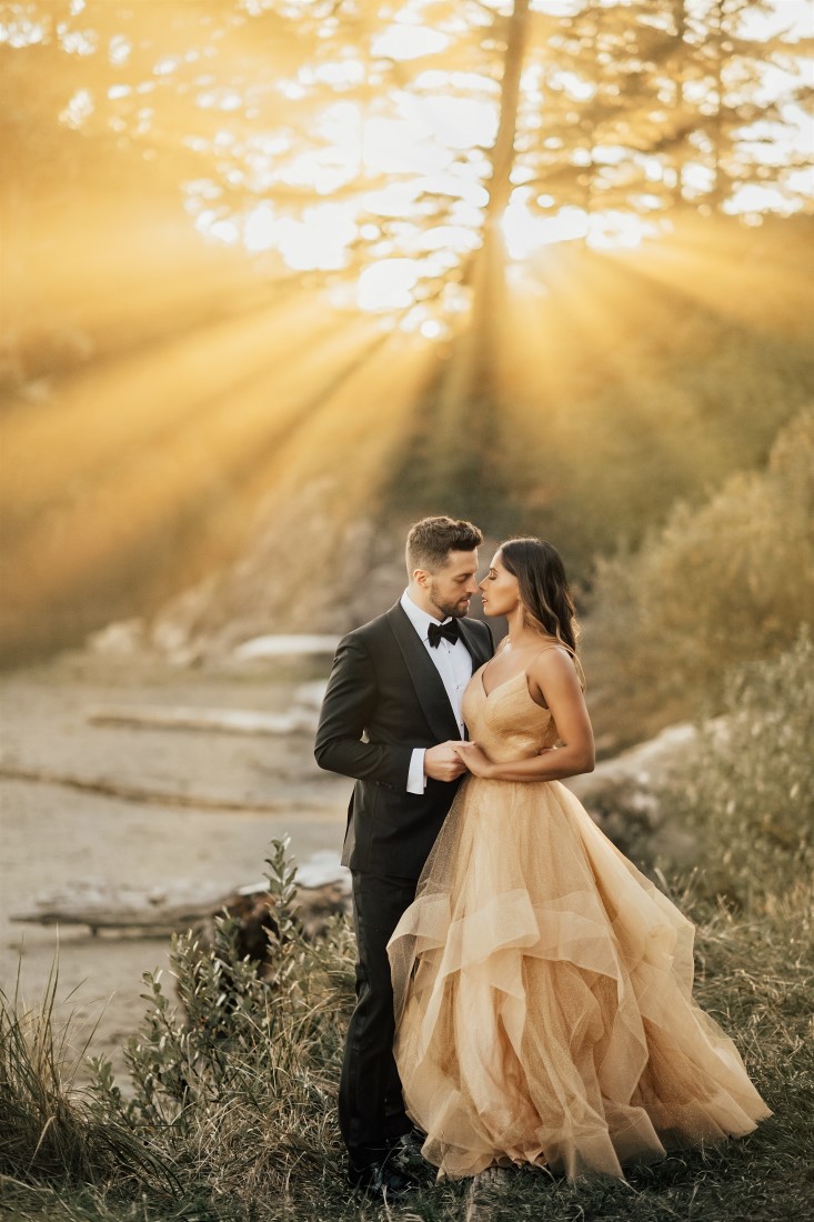 Sunset behind eloping couple on Vancouver Island