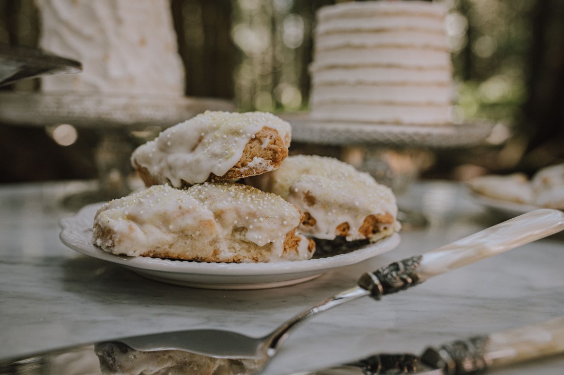 Sidney scones sit on forest wedding dessert table on Vancouver Island