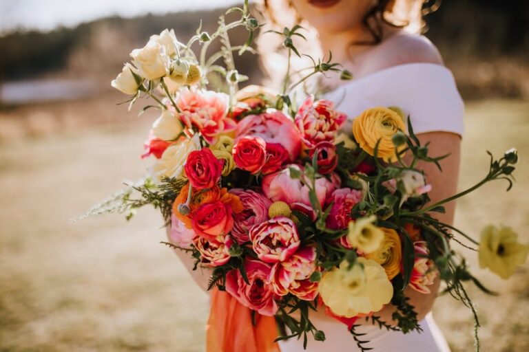 Peach, pink and yellow rose bridal bouquet by Foxglove Flowers