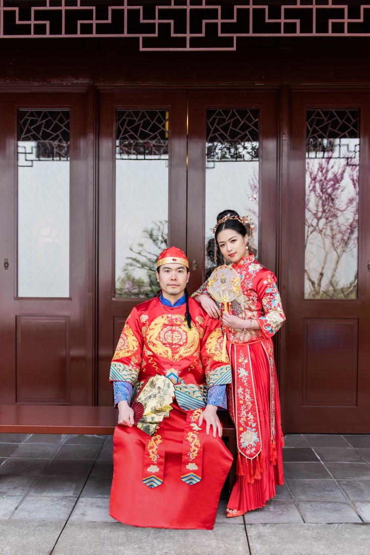 Traditional Chinese gowns on modern Vancouver couple