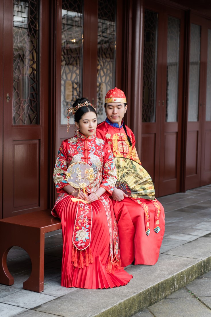 Traditional Chinese Engaged Couple wearing red 