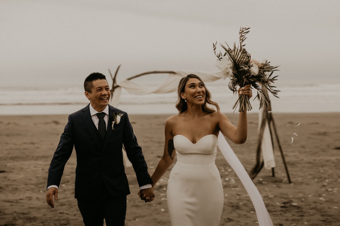 Tofino Long Beach Wedding Ceremony with Floral Backdrop