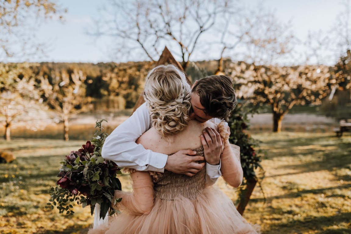 newlywed embrace by Elyse Anna Photography