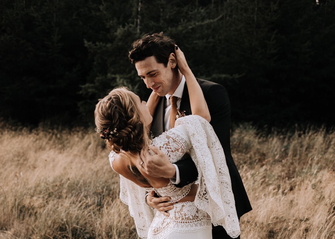 Swaying together in Fields of Gold Landscape Wedding