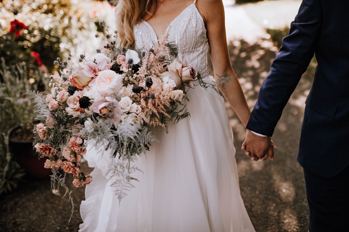 Blush roses, thistle, soft fern bouquet