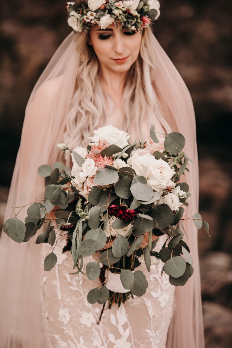 Bride with Bouquet eucalyptus and white roses