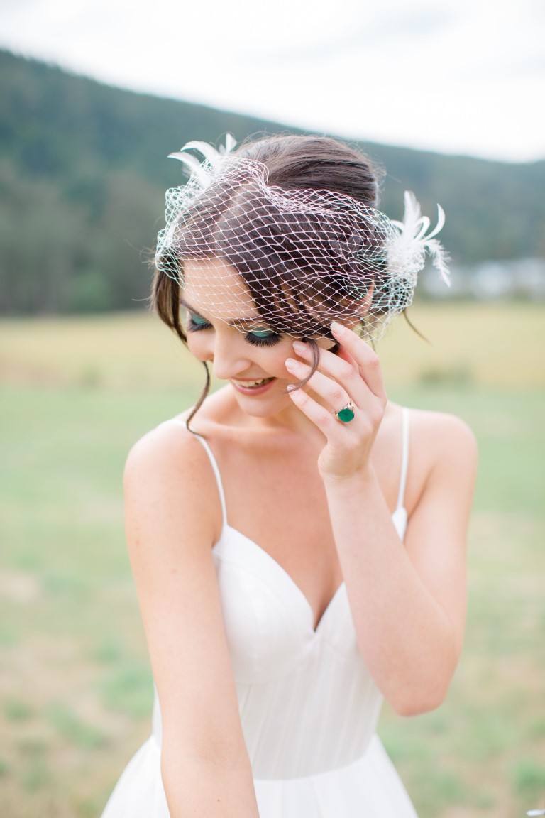 Bride with Emerald Green Ring and Blusher by The Brides Closet in Nanaimo