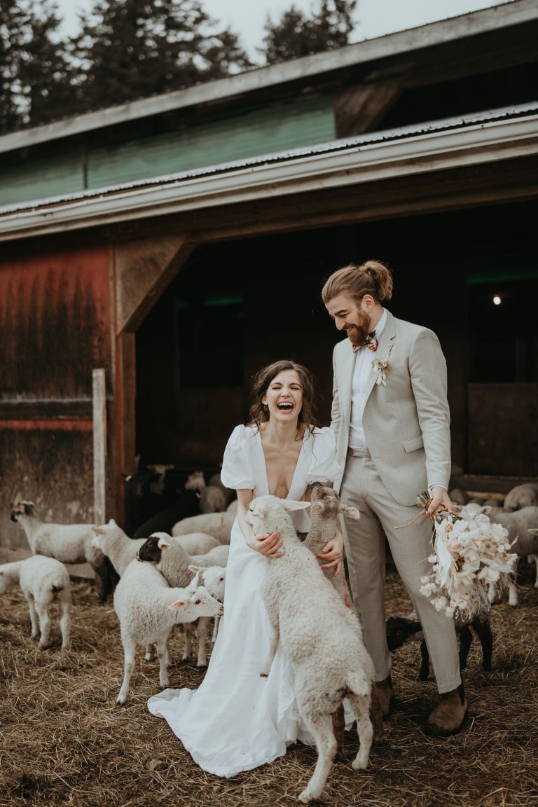 Us + Ewe Farm Wedding Inspiration bride and groom with sheep